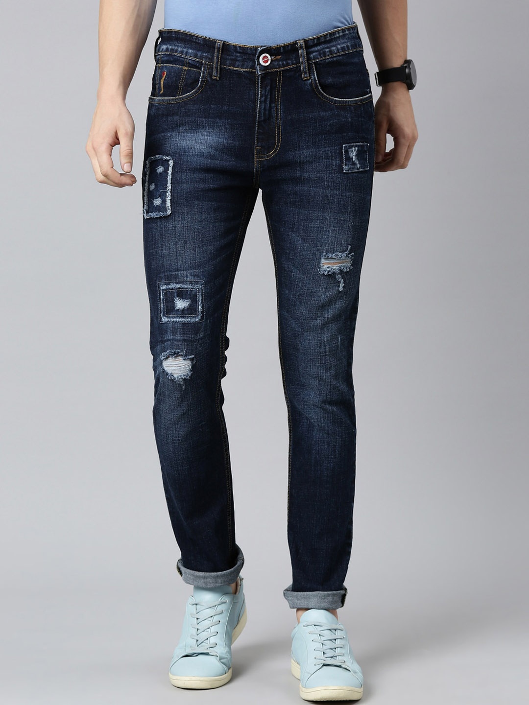 

CINOCCI Men Blue Slim Fit Mildly Distressed Light Fade Stretchable Jeans