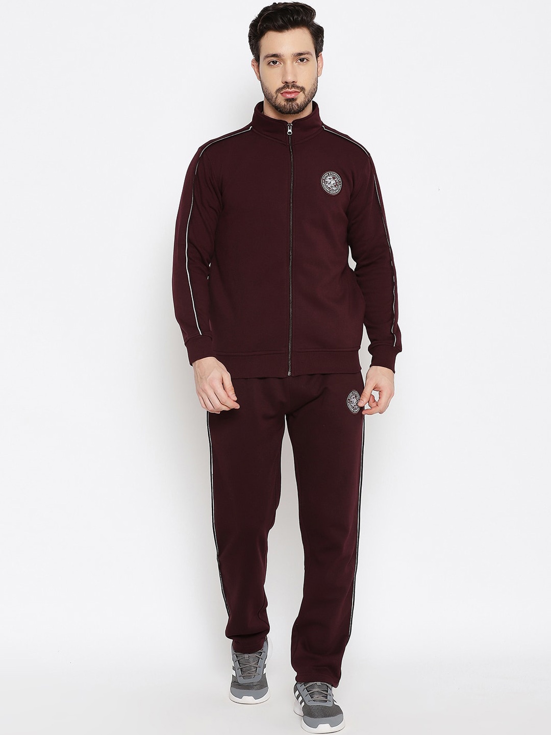 

Duke Men Maroon Solid Tracksuits