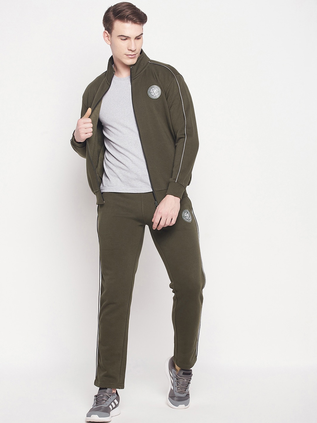 

Duke Men Olive Green Solid Tracksuits