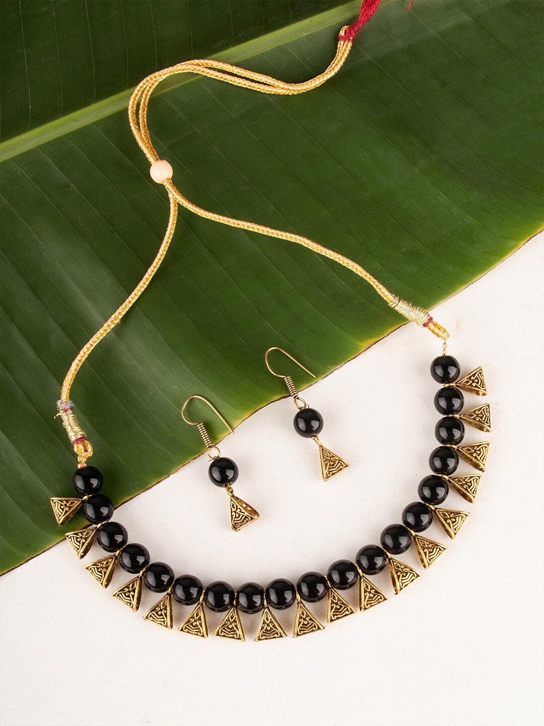 

Ozanoo Black & Gold Plated Designer Loop Beaded Necklace Set