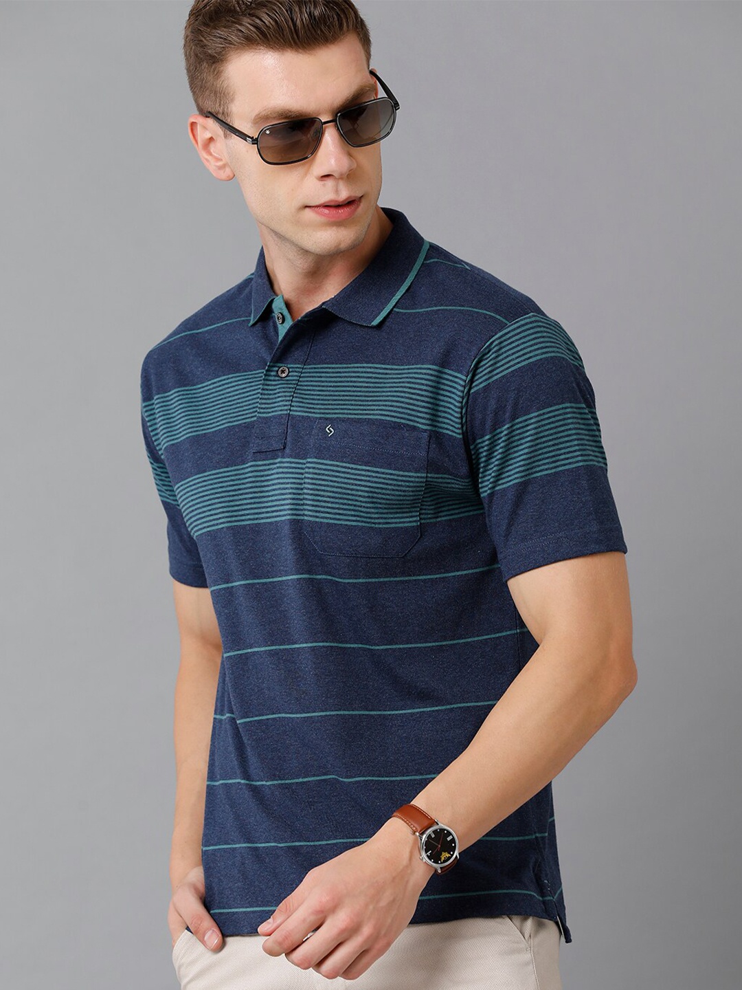 

Classic Polo Men Navy Blue & Sea Green Striped Polo Collar T-shirt