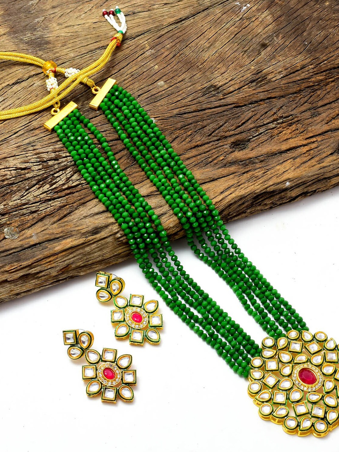 

Jewar Mandi Gold-Plated White & Green Kundan Studded & Pearls Beaded Jewellery Set