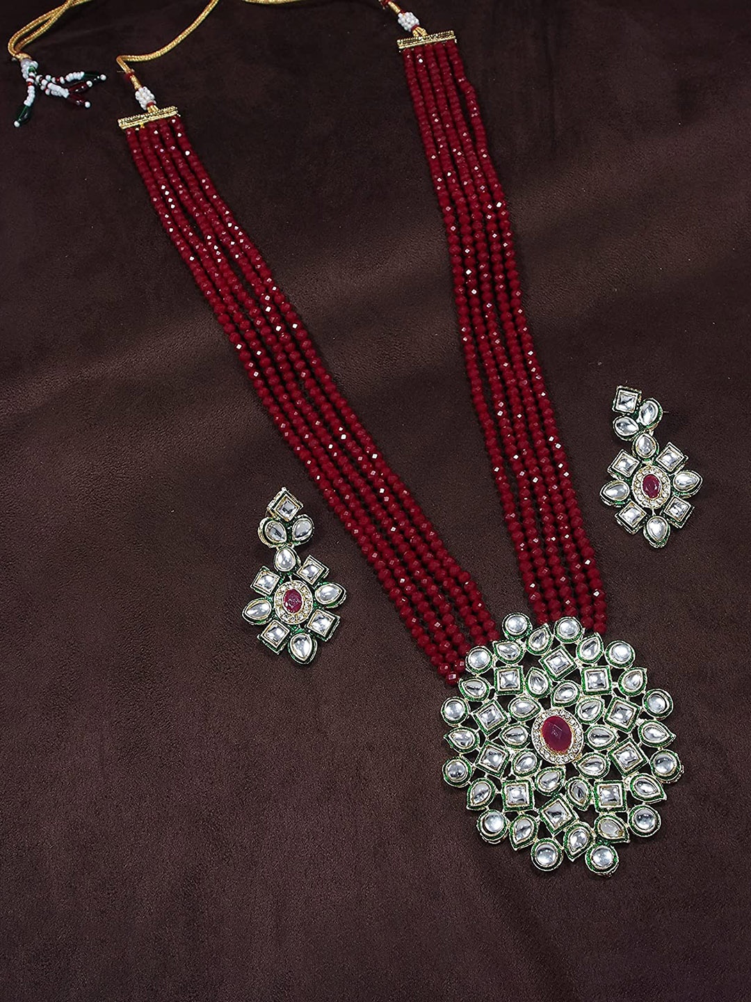 

Jewar Mandi Gold-Plated Maroon & White Kundan Stone-Studded & Beaded Jewellery Set