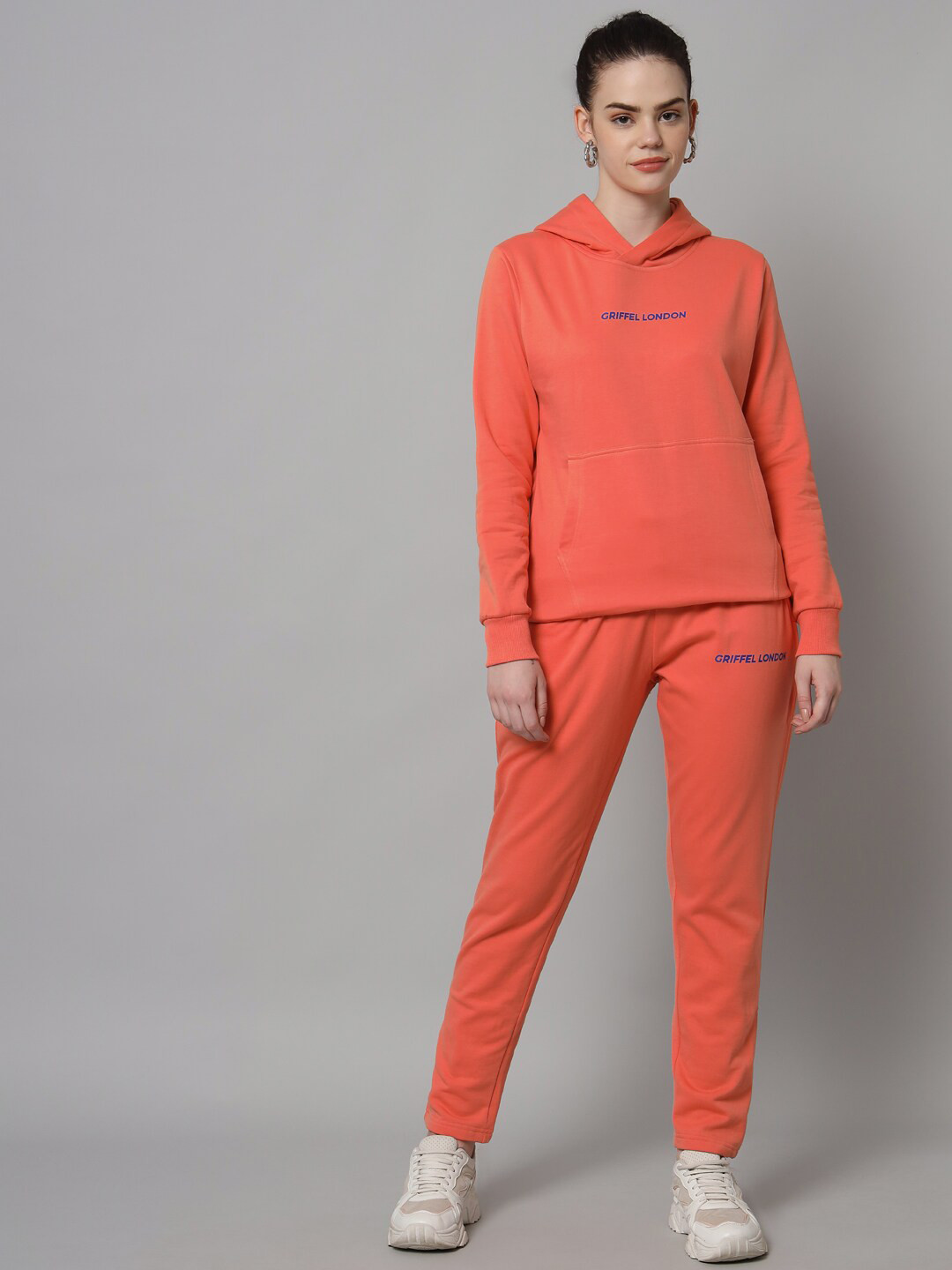 

GRIFFEL Women Peach-Coloured Solid Tracksuits