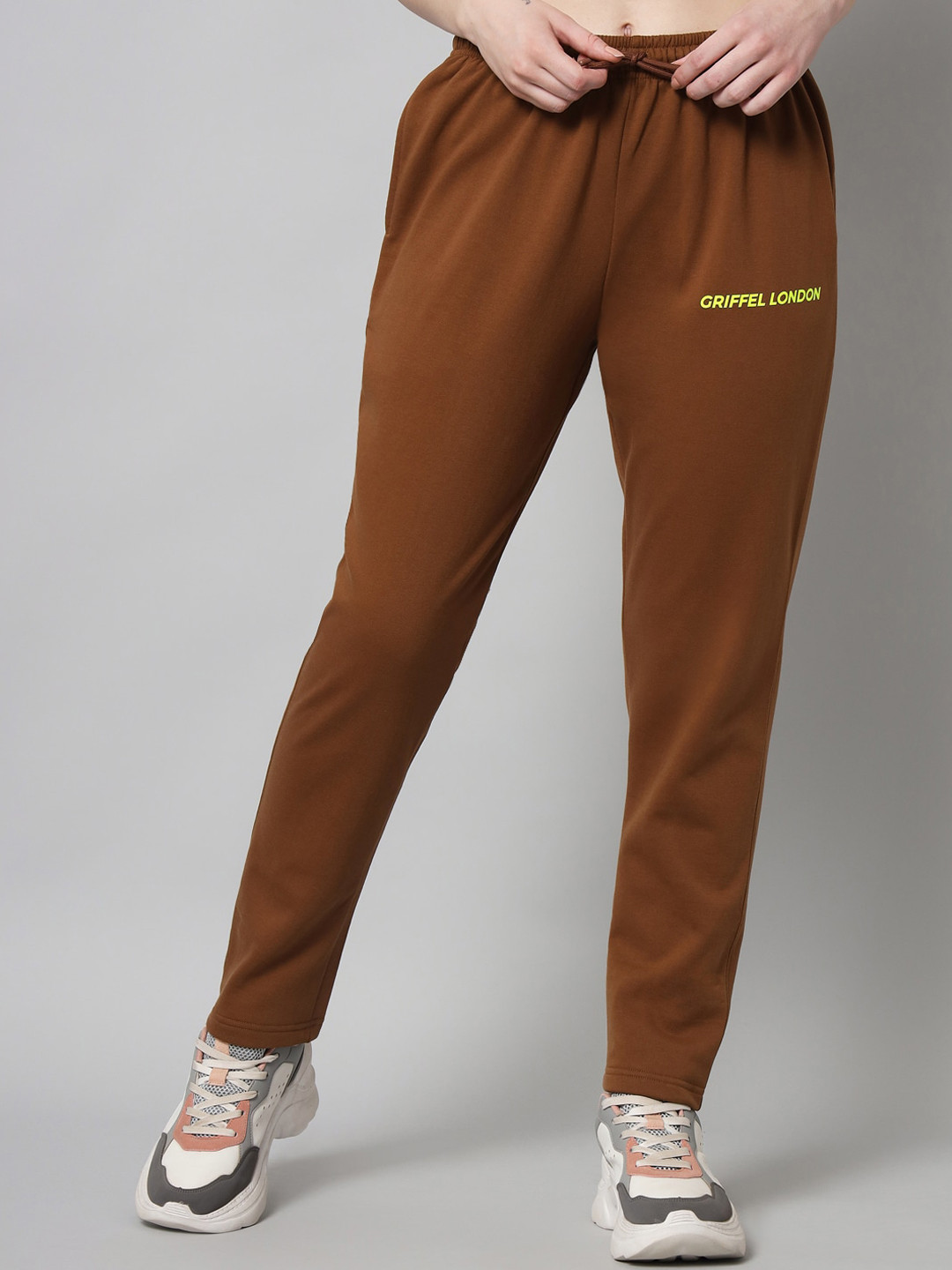 

GRIFFEL Women Brown Solid And brand Logo Printed Track Pants, Black