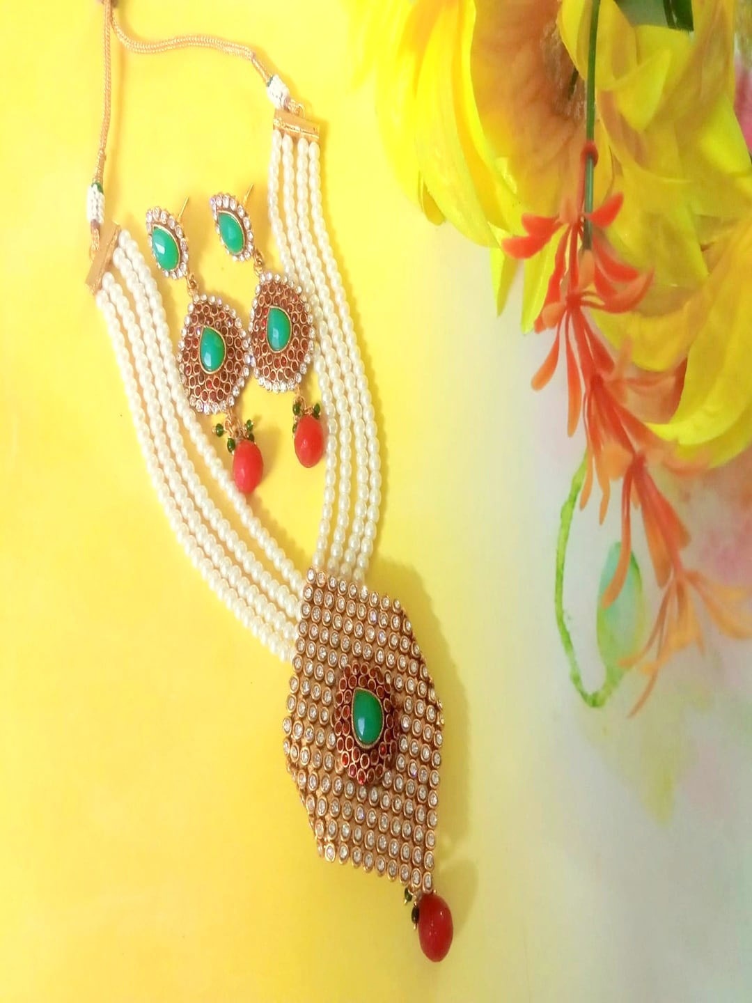 

Runjhun Gold-Plated Red & Green Stone-Studded & Beaded Jewellery Set