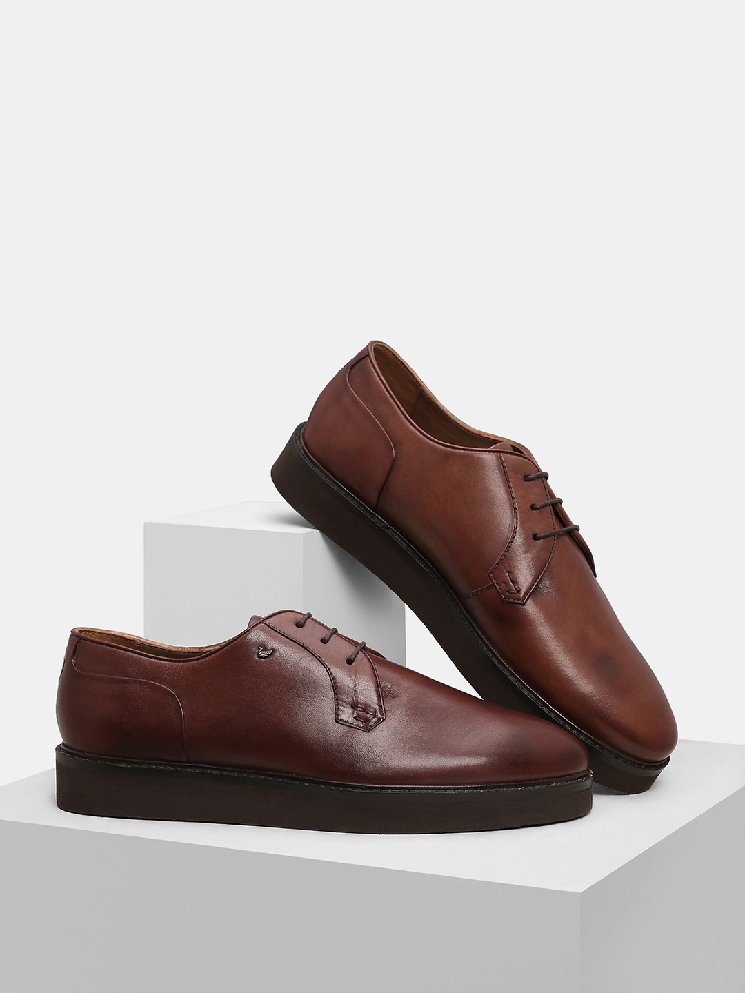 

Blackberrys Men Brown Solid Leather Formal Derbys