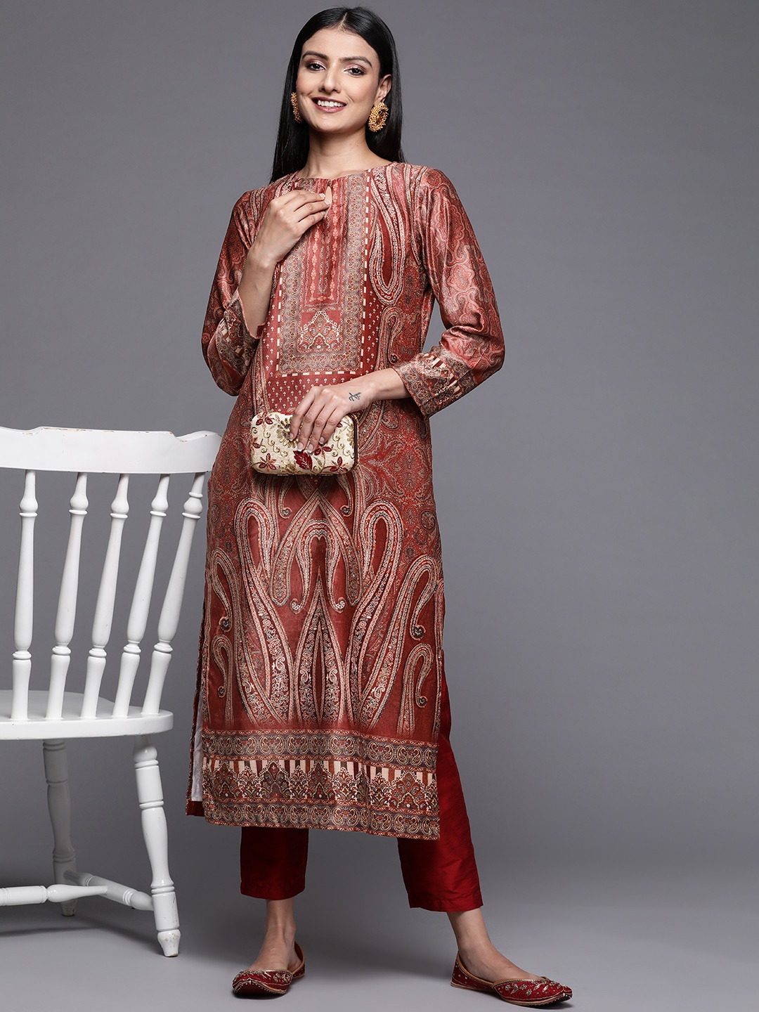 

Libas Women Rust Paisley Printed Keyhole Neck Velvet Kurta