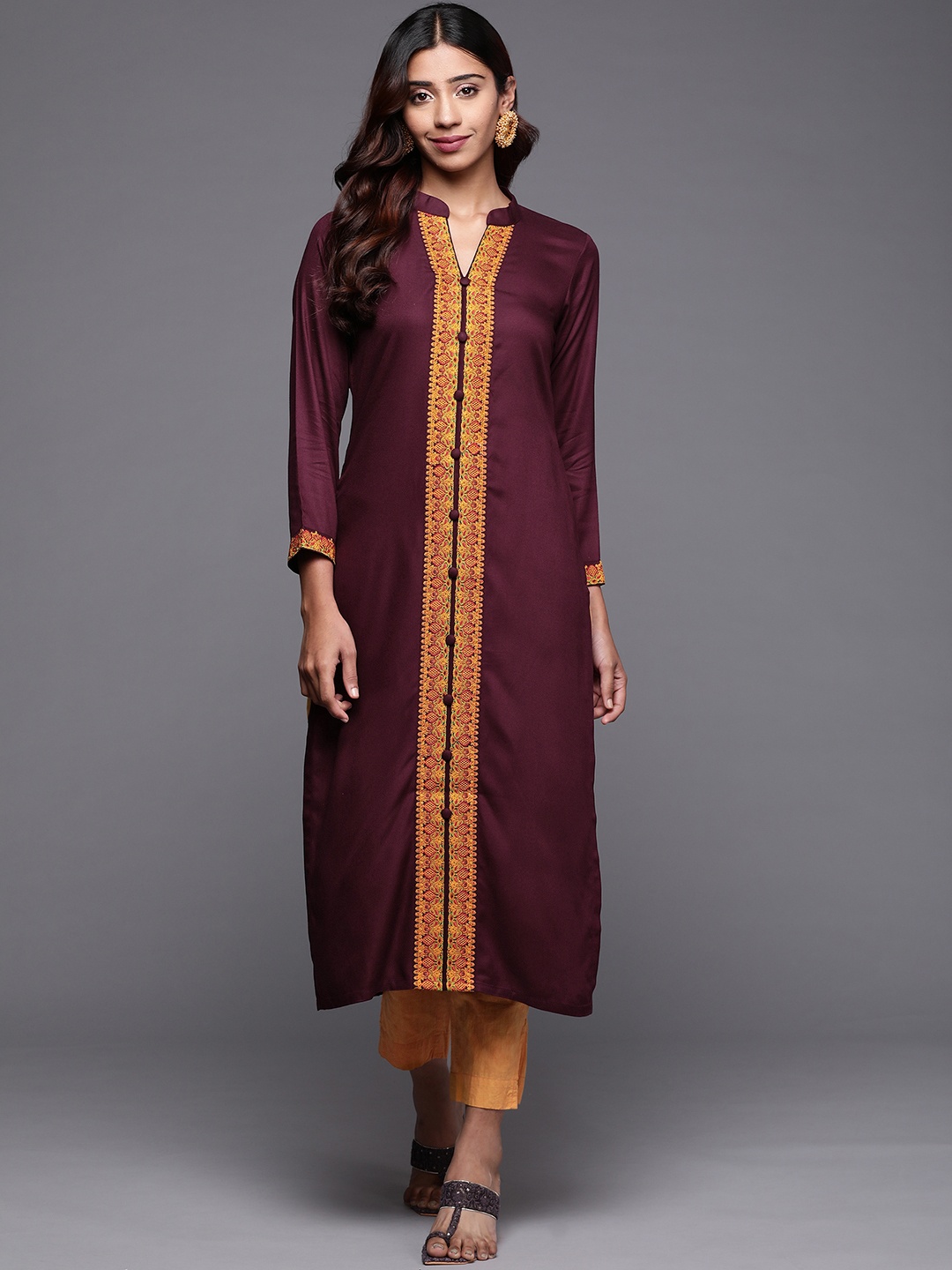 

Libas Women Purple Pashmina Wool Floral Embroidered Kurta