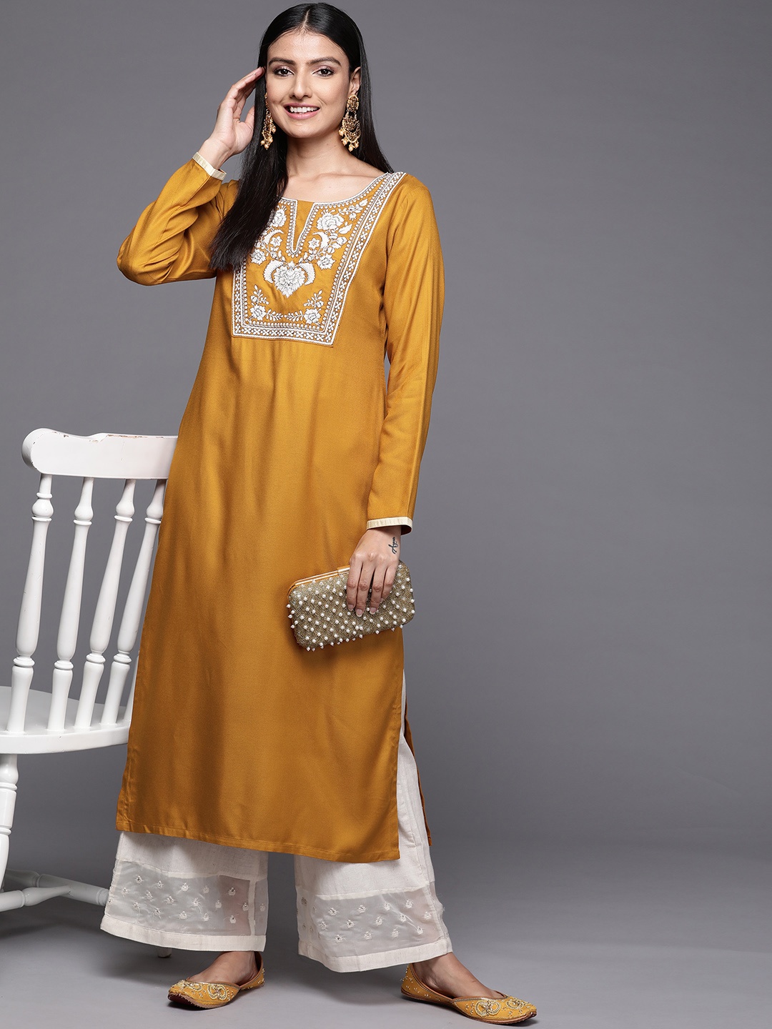 

Libas Women Mustard Yellow Pashmina Wool Floral Yoke Design Kurta