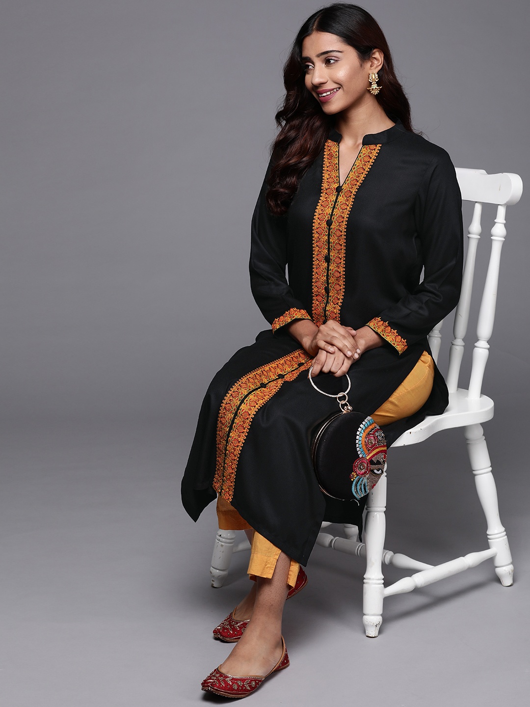 

Libas Women Black Pashmina Wool Floral Embroidered Kurta