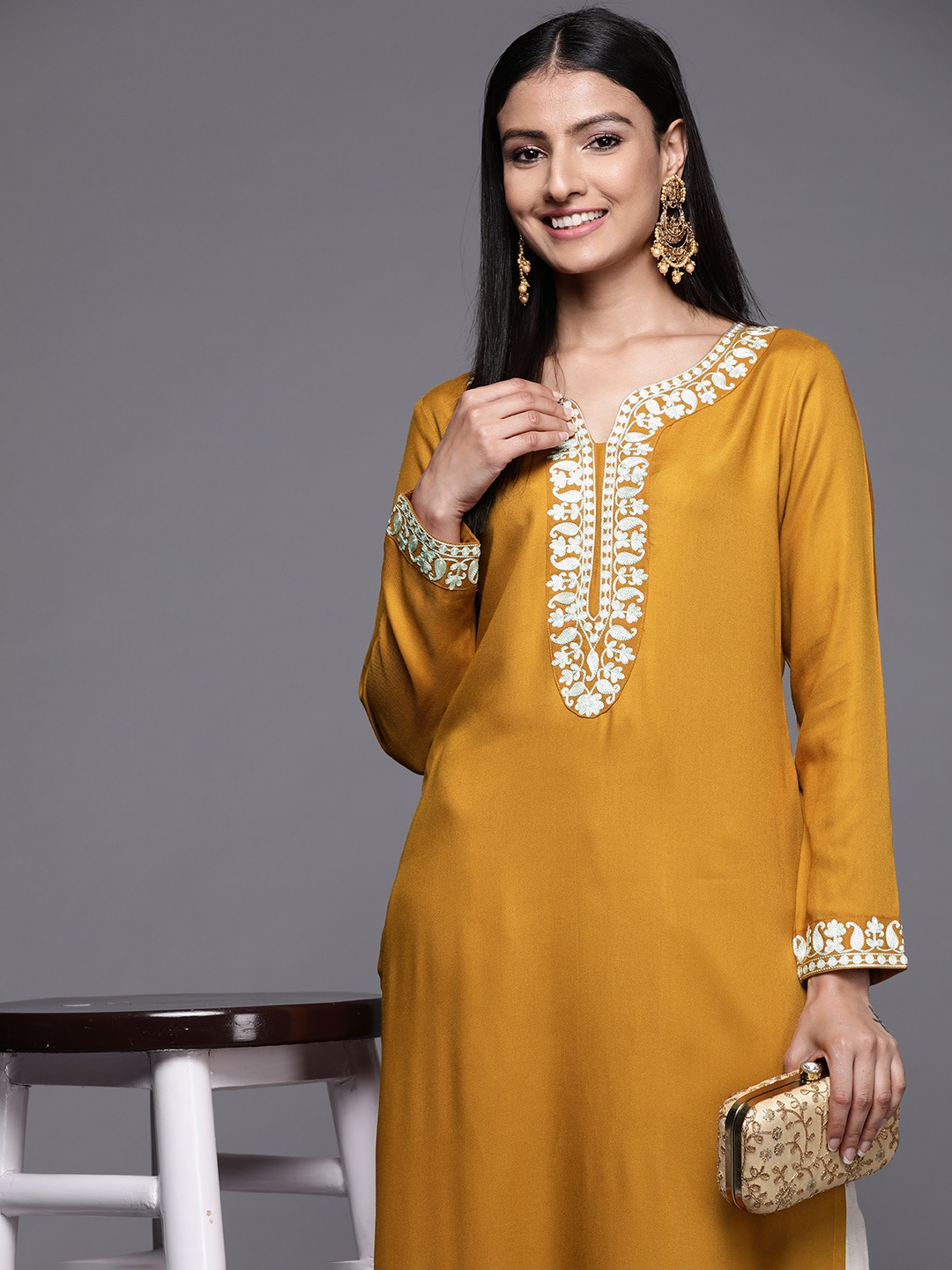 

Libas Women Mustard Yellow Pashmina Wool Paisley Yoke Design Kurta