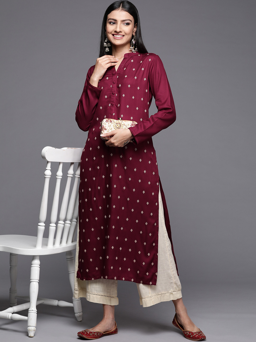 

Libas Women Maroon Pashmina Wool Geometric Embroidered Kurta