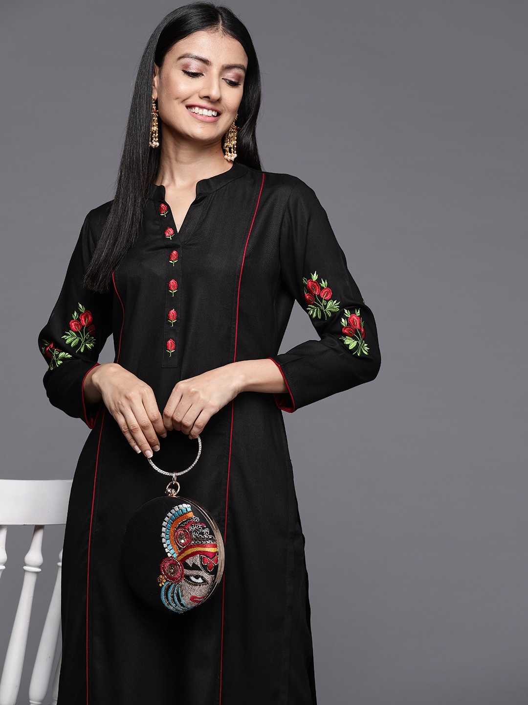 

Libas Women Black Pashmina Wool Floral Embroidered Kurta
