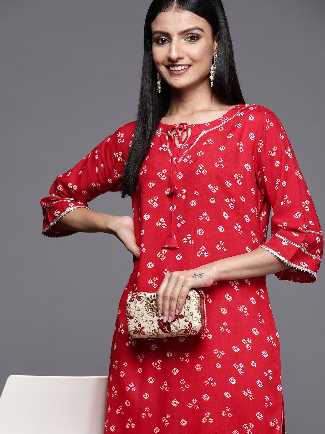 

Libas Women Red Bandhani Printed Gotta Patti Kurta