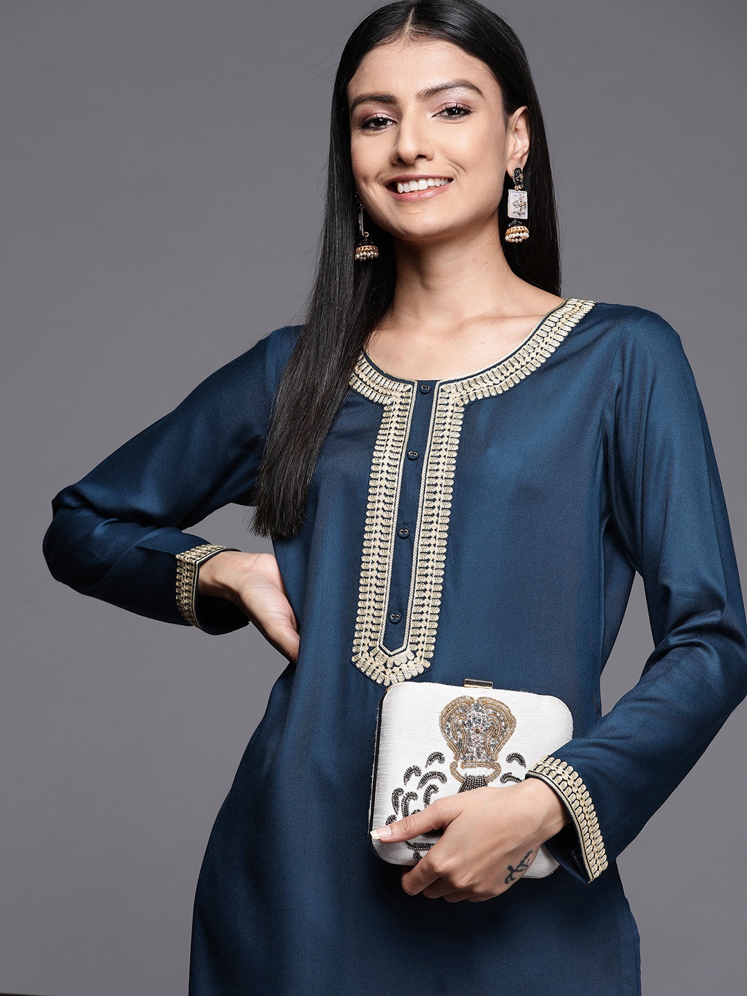

Libas Women Teal Geometric Embroidered Thread Work Pashmina Wool Kurta