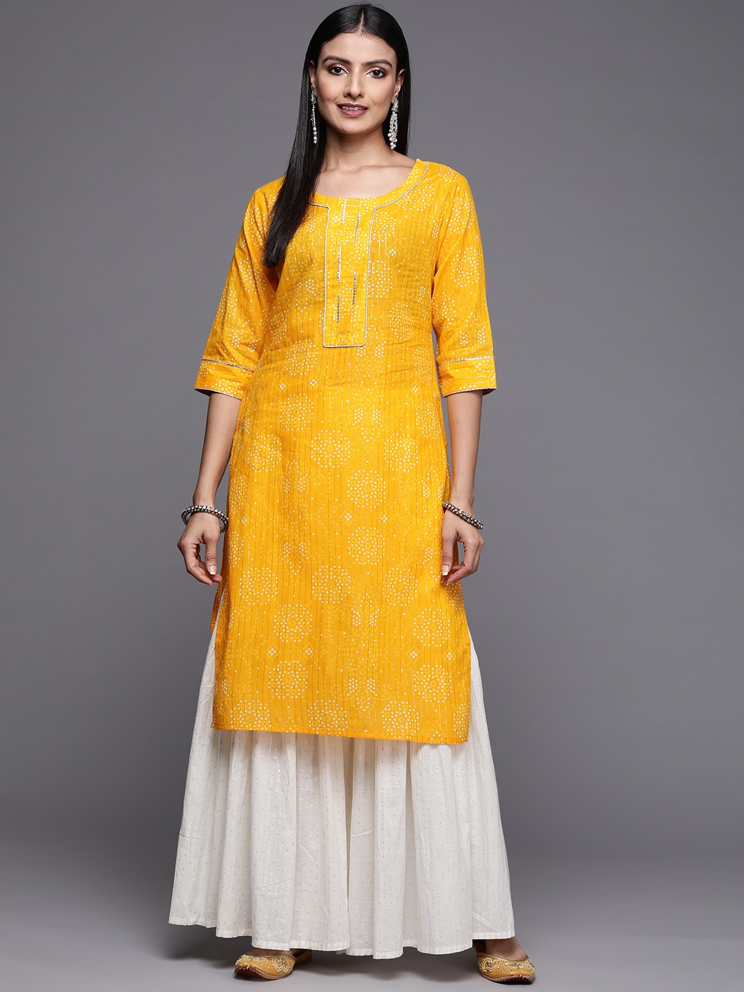 

Libas Women Yellow Bandhani Printed Cotton Gotta Patti Kurta