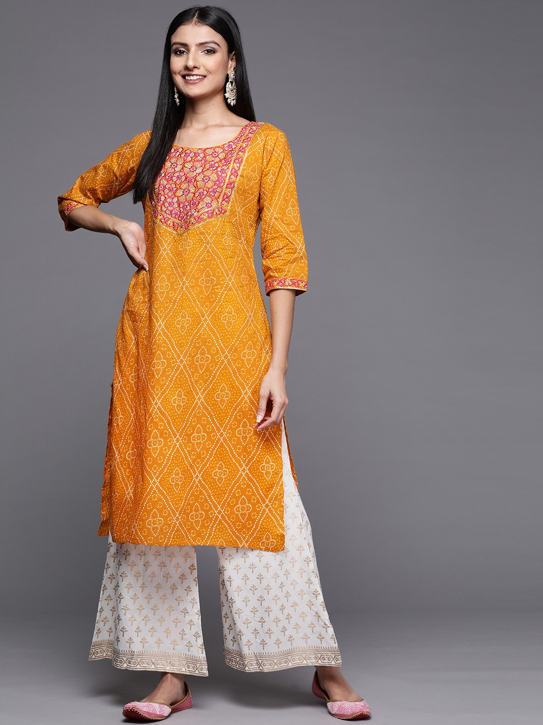 

Libas Women Mustard Yellow Bandhani Printed Gotta Patti Cotton Kurta