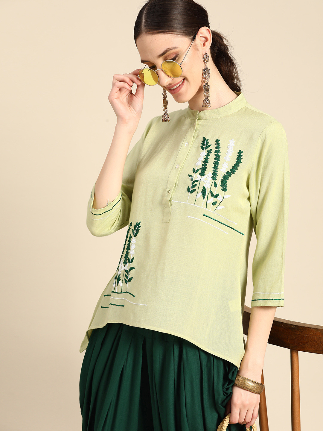 

Sangria Women Green Ethnic Motifs Embroidered Thread Work Top with Dhoti Pants
