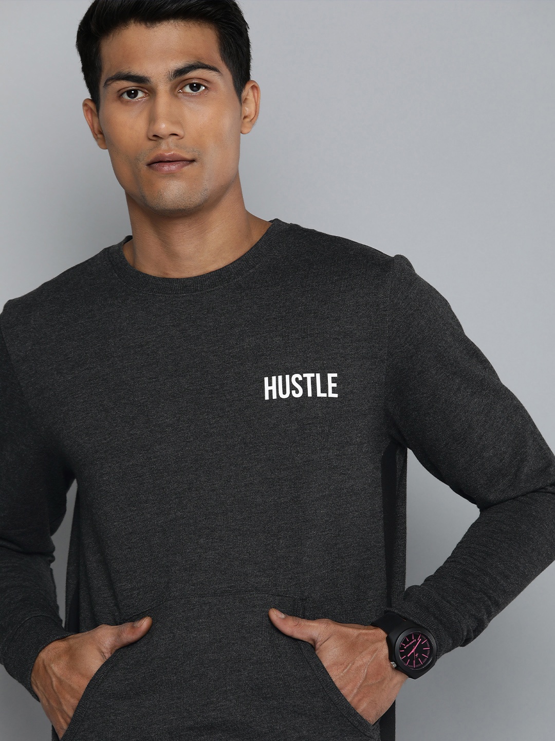 

HRX by Hrithik Roshan Men Black Solid Sweatshirt