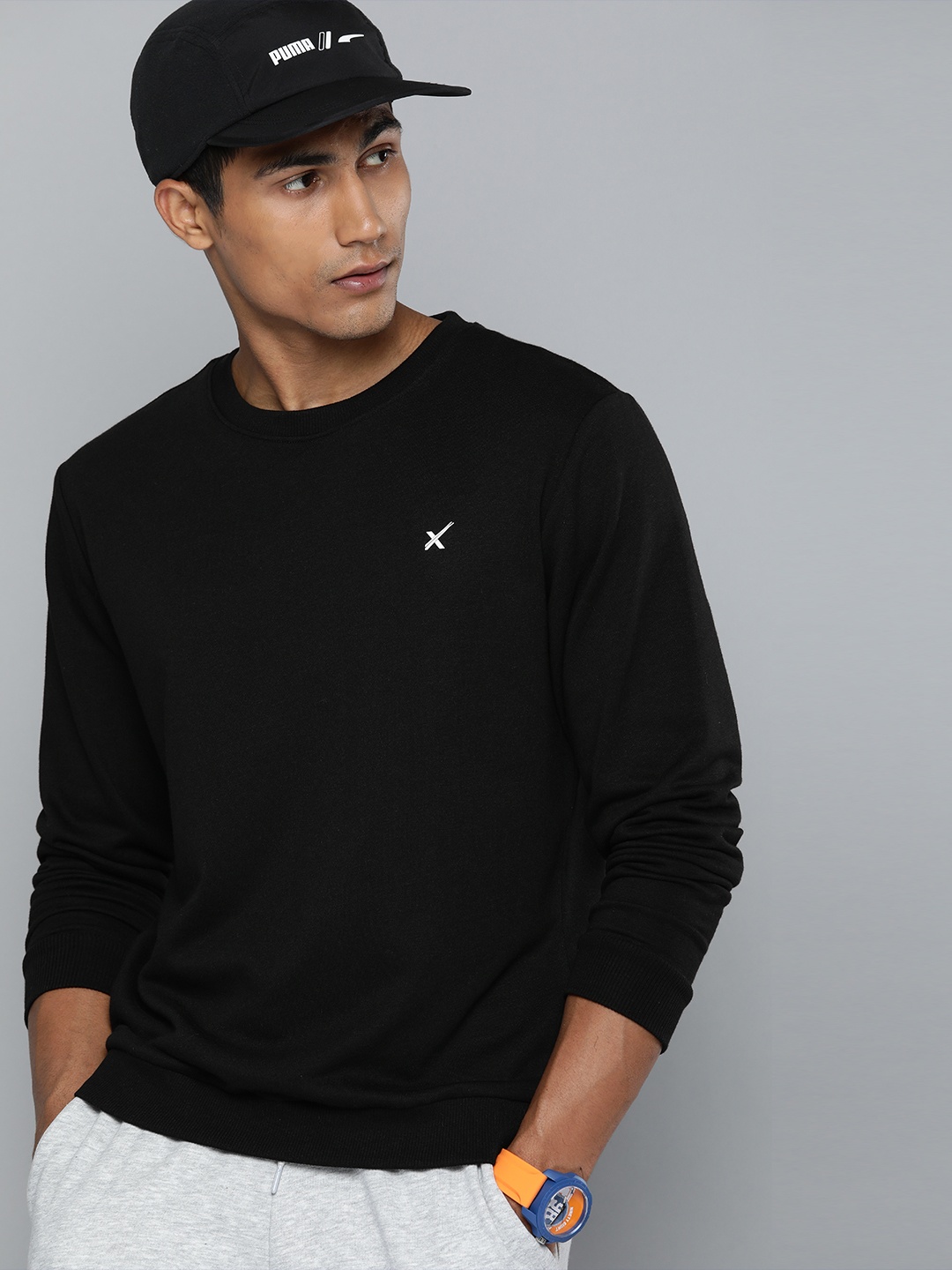 

HRX by Hrithik Roshan Men Black Solid Sweatshirt