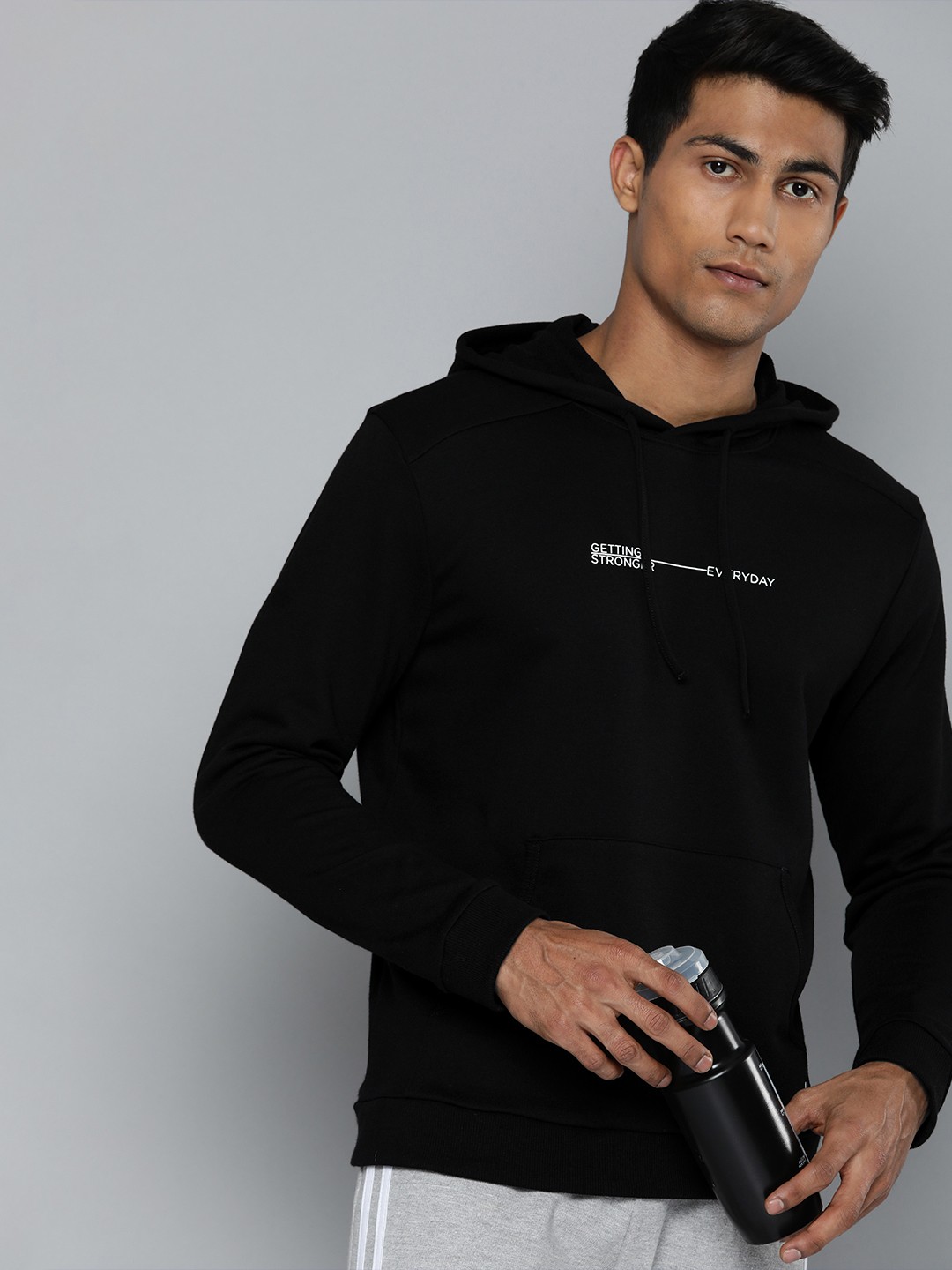 

HRX by Hrithik Roshan Men Black Typography Printed Hooded Sweatshirt