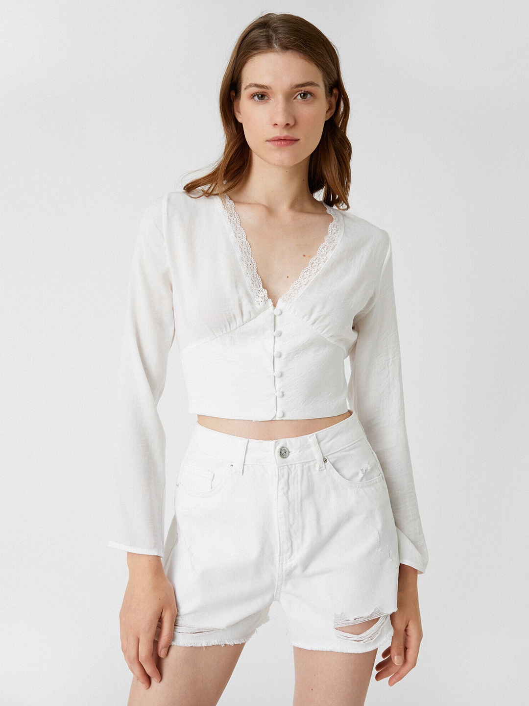 

Koton White Solid V-Neck Lace Detail Empire Crop Top