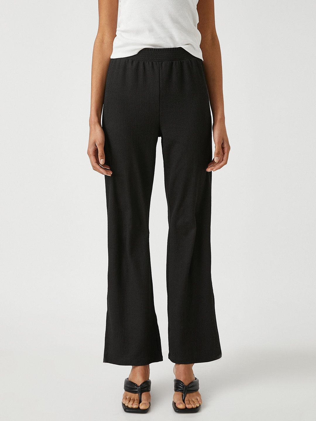 

Koton Women Black Solid Trousers