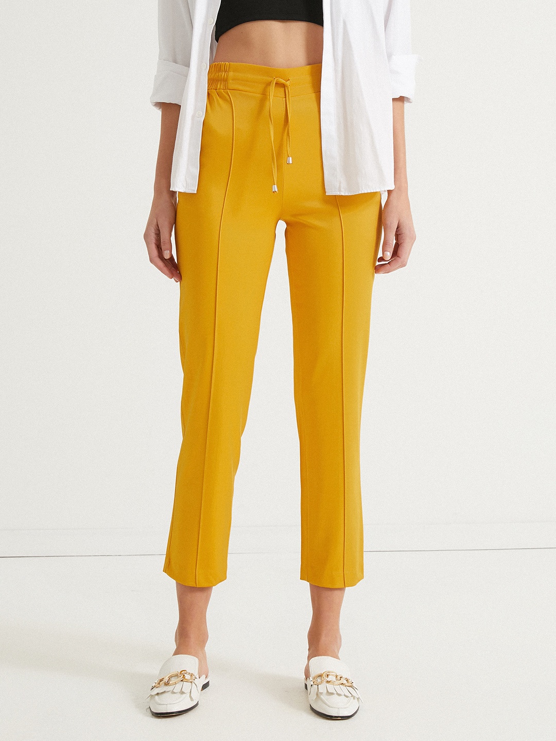 

Koton Women Mustard Yellow Solid Trousers