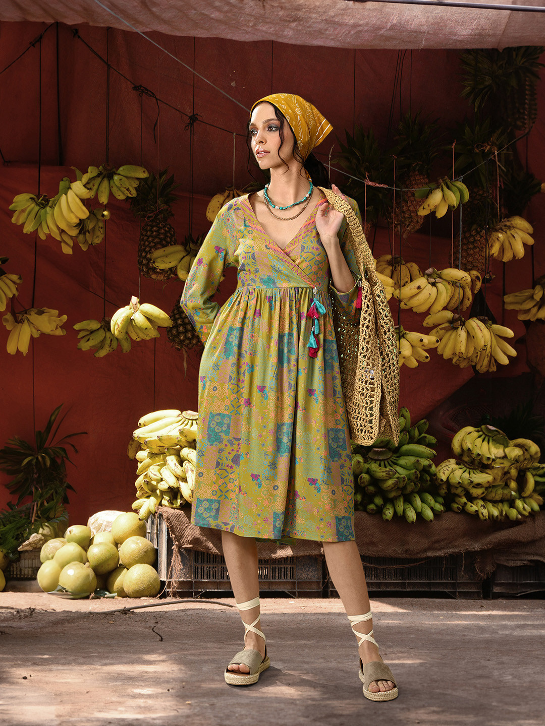 

Sangria Printed Tasseled Verdant Green Viscose Rayon Ethnic Wrap Dress