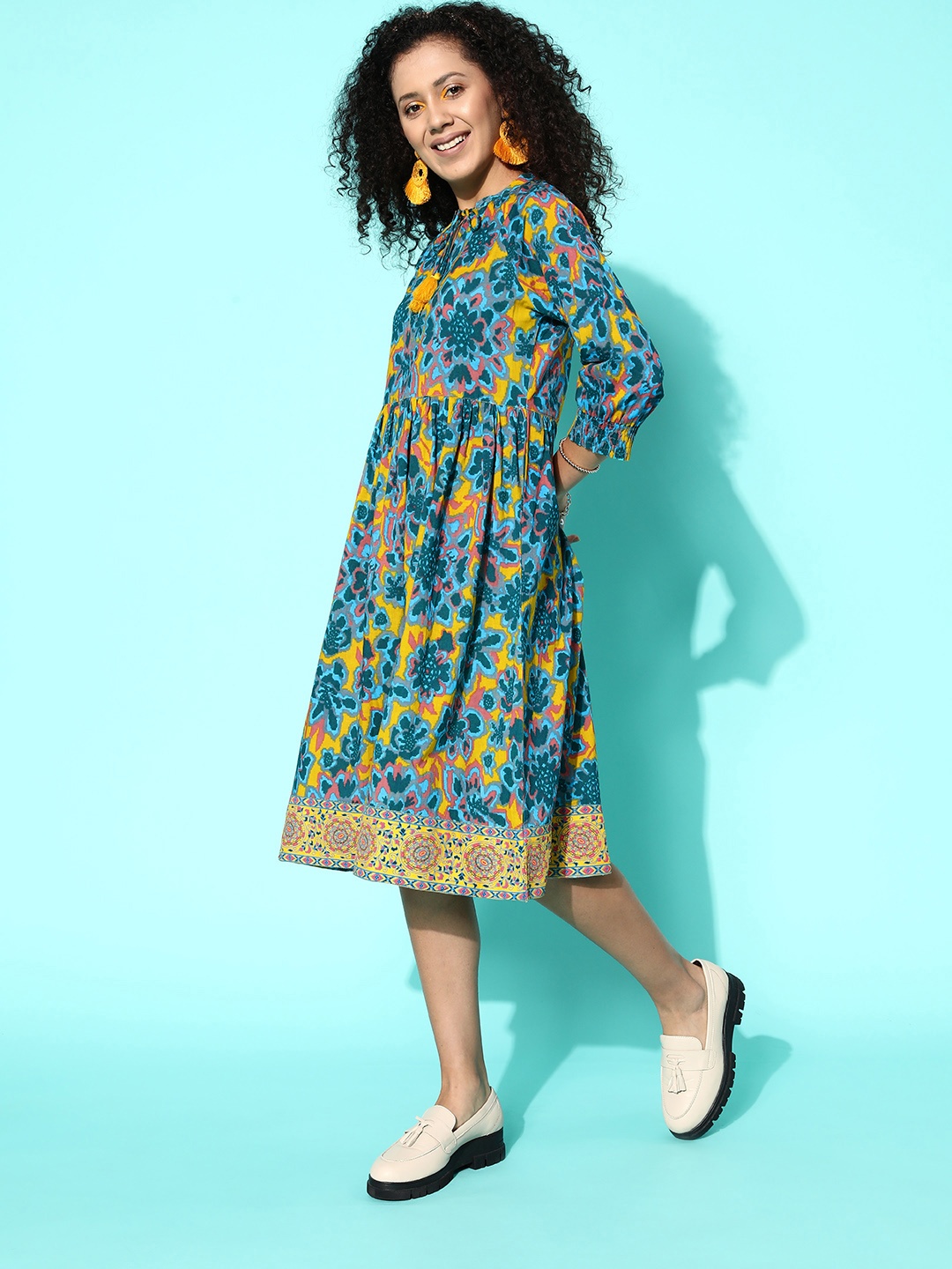 

Sangria Overblown Yellow & Blue Floral Print Tie-Up Neck Comfort-Fit-Chic Ethnic Dress