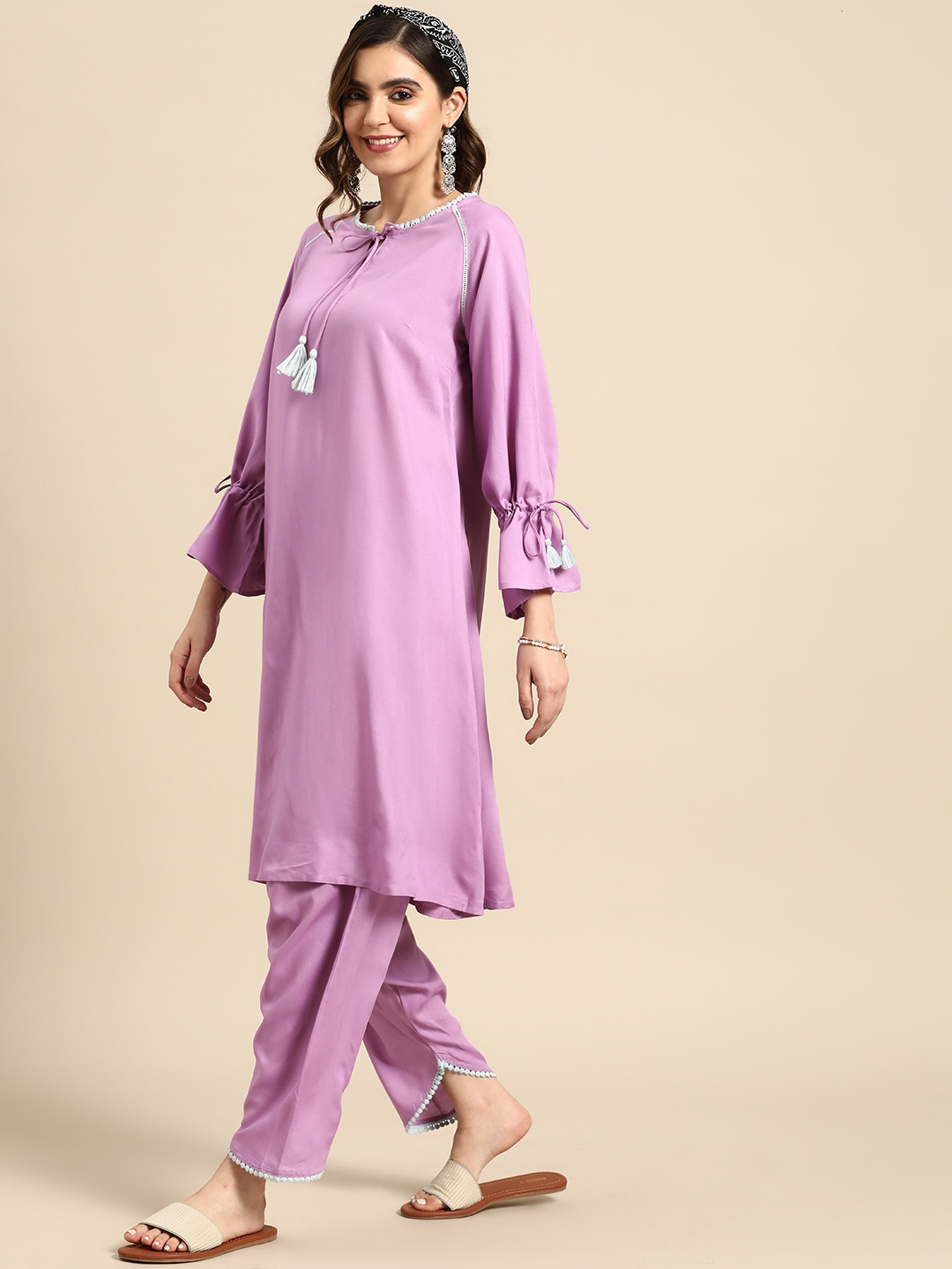 

Sangria Women Tie-Up Neck Bell Sleeves Pleated A-line Kurta with Salwar, Lavender