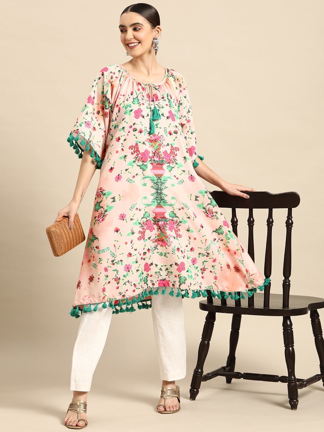 

Sangria Women Floral Print A-line Kurta with Tassels, Peach