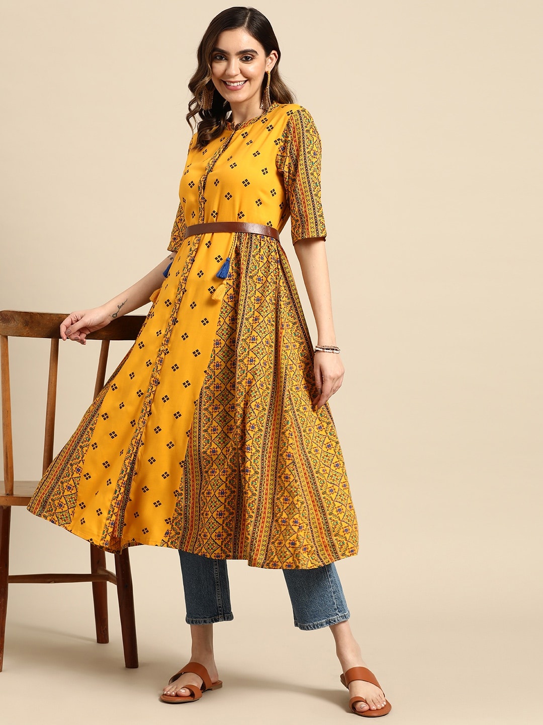 

Sangria Geometric Printed Tasseled A-line Kurta, Mustard
