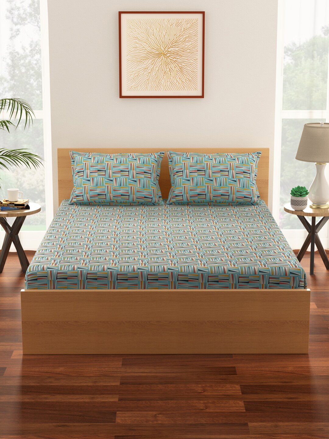 

Living scapes by Pantaloons Blue & Yellow Geometric 144 TC Queen Bedsheet with 2 Pillow Covers