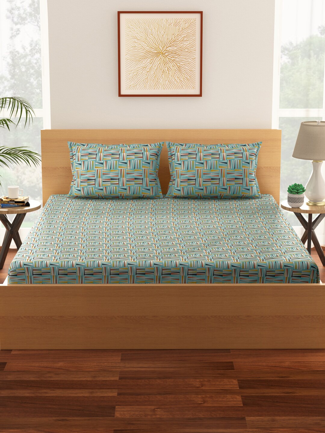 

Living scapes by Pantaloons Blue & Yellow Geometric 144 TC King Bedsheet with 2 Pillow Covers