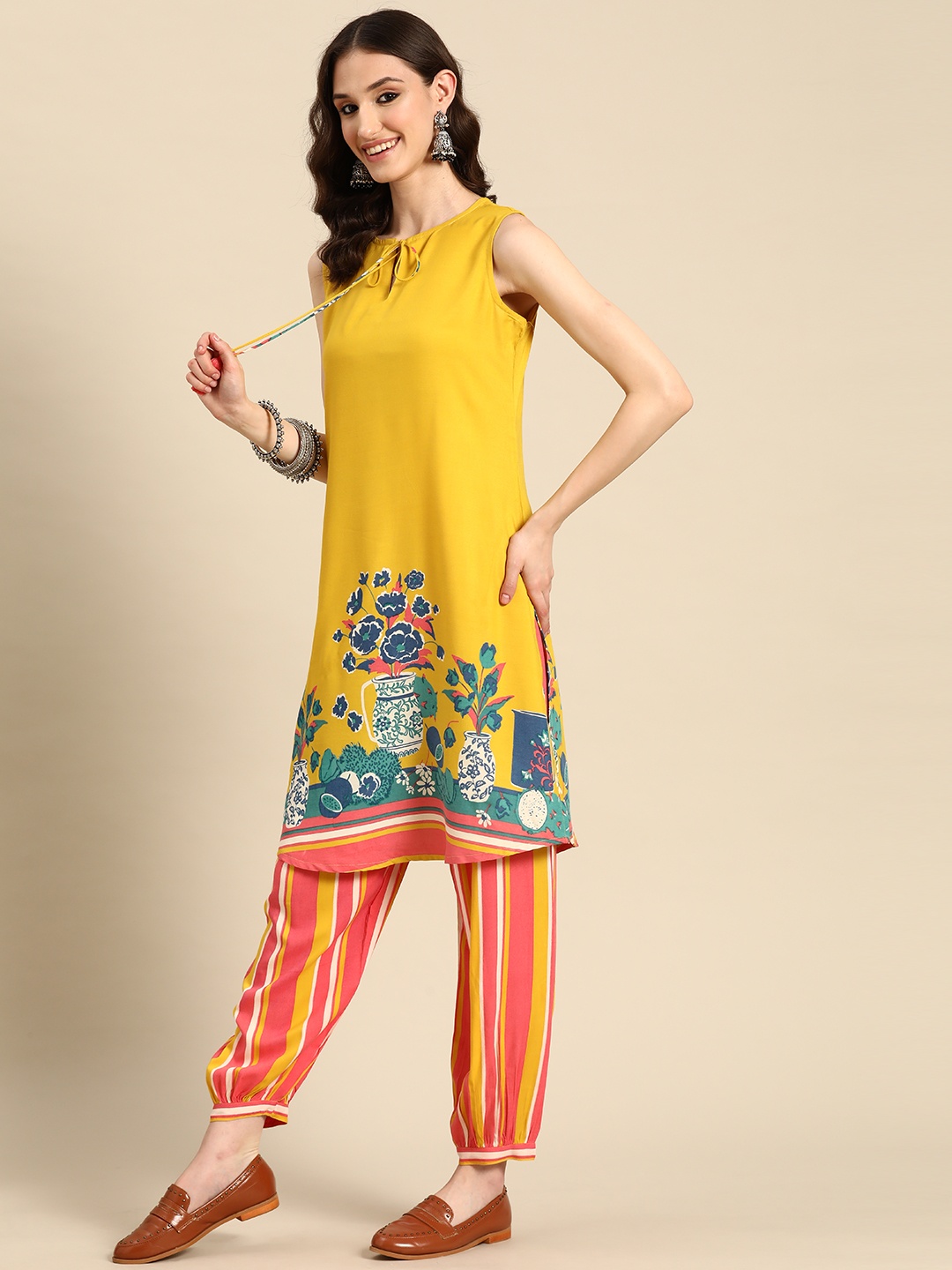 

Sangria Women Ethnic Motifs Printed Kurta with Salwar, Yellow