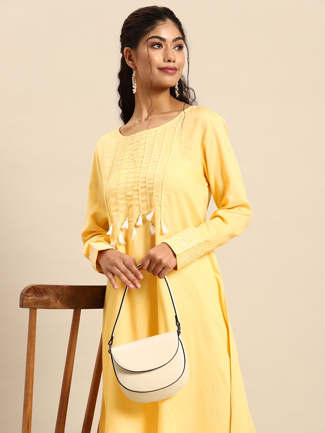 

Sangria Yoke Design Thread Work Tassels A-Line Kurta, Yellow