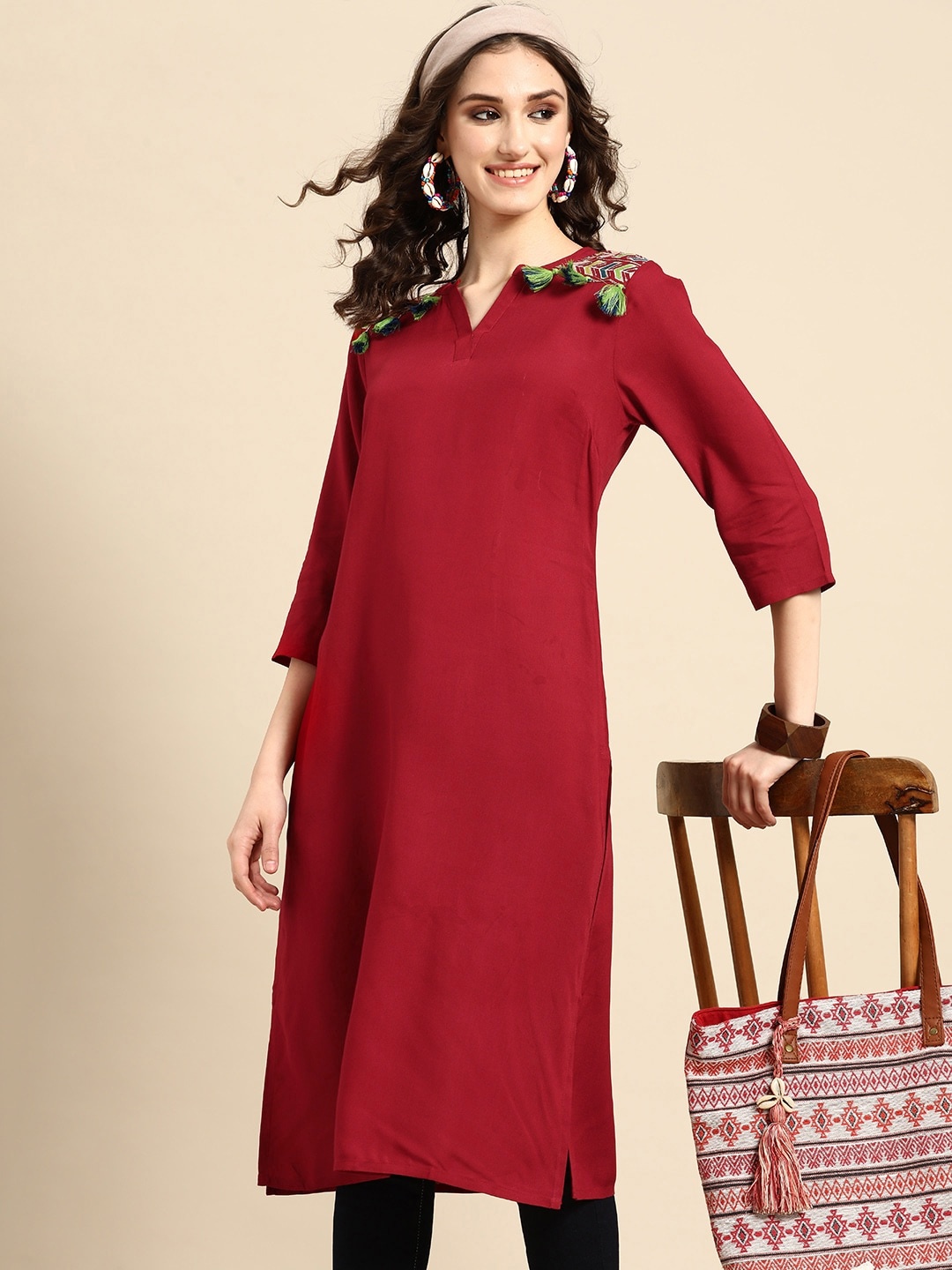 

Sangria Women Tassel Detail Straight Kurta with Pocket, Red