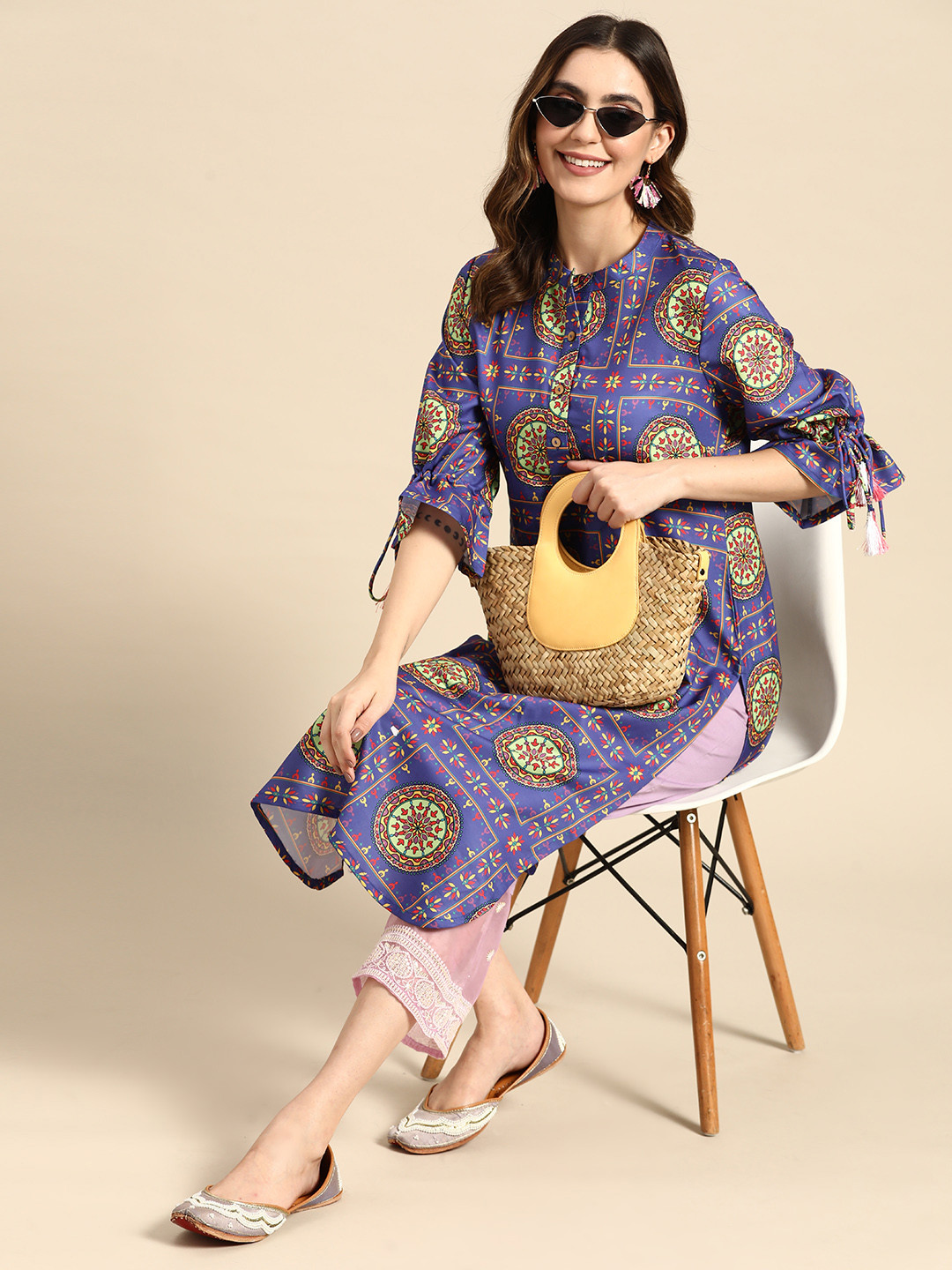

Sangria Women Ethnic Motifs Printed Bell Sleeves Kurta, Violet