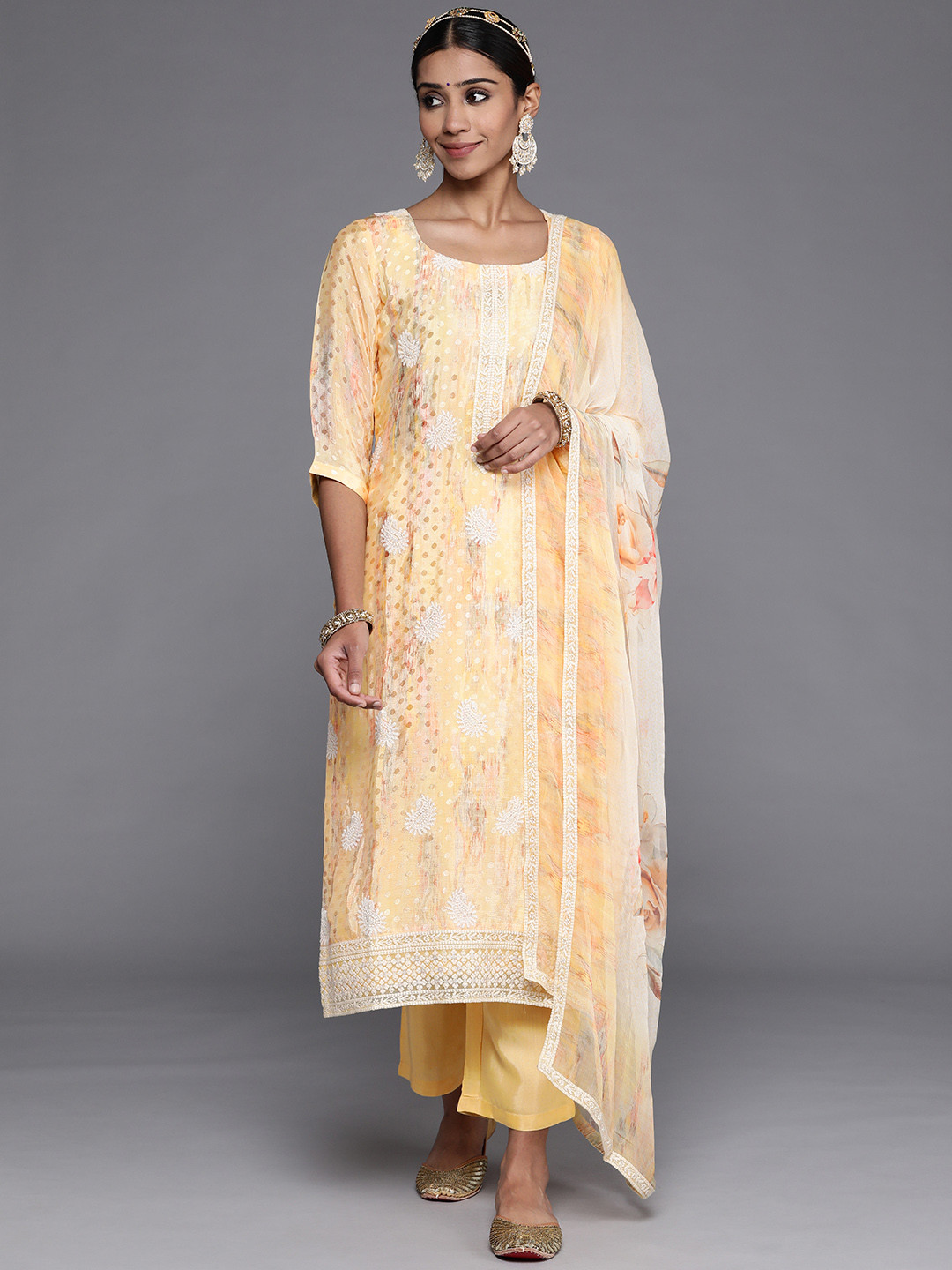

Libas Women Yellow Paisley Embroidered Thread Work Kurta with Trousers & With Dupatta