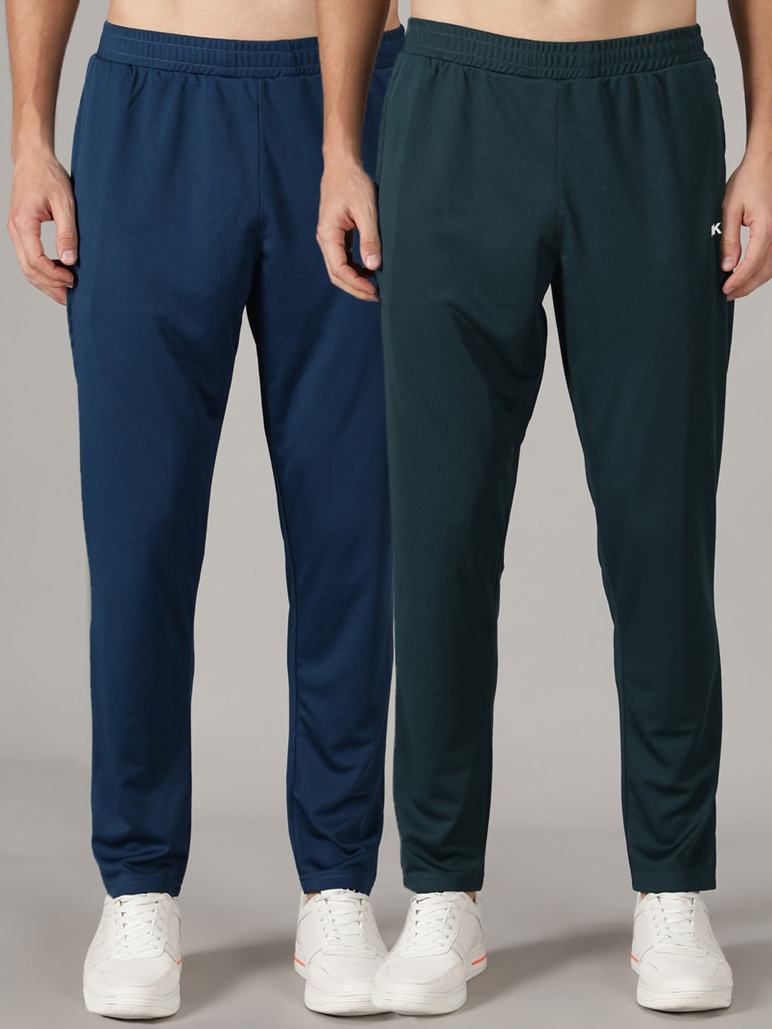 

MKKO Men Pack Of 2 Blue & Green Solid Track Pants