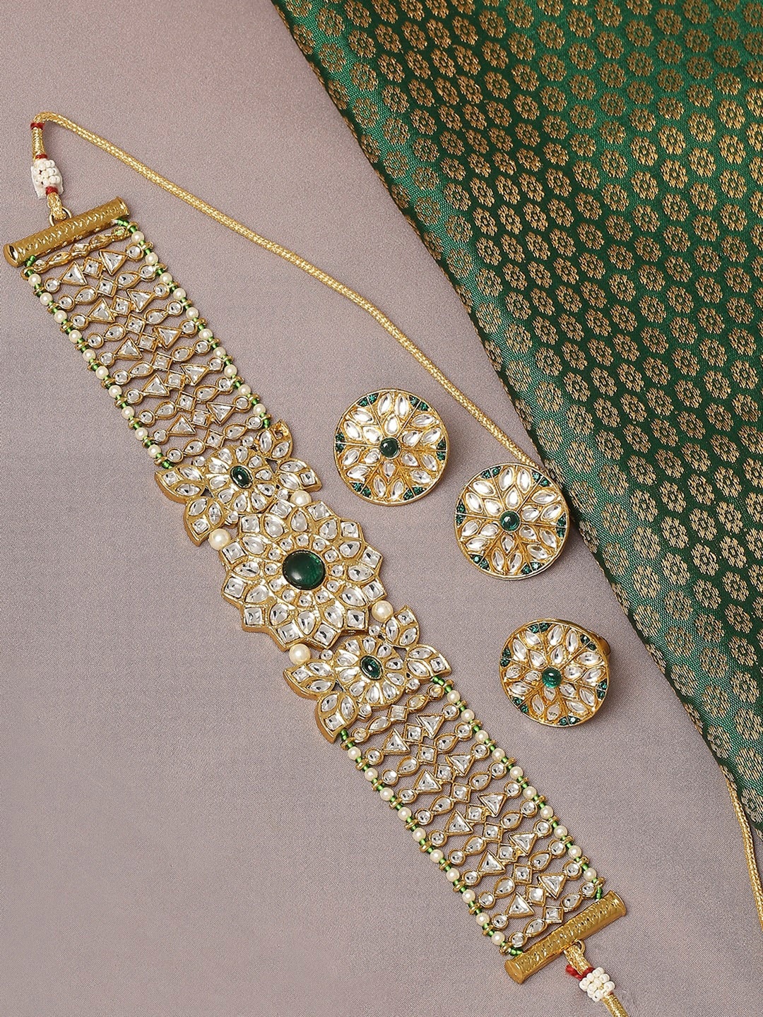 

OOMPH Gold-Toned & Green Kundan Studded Jewellery Set