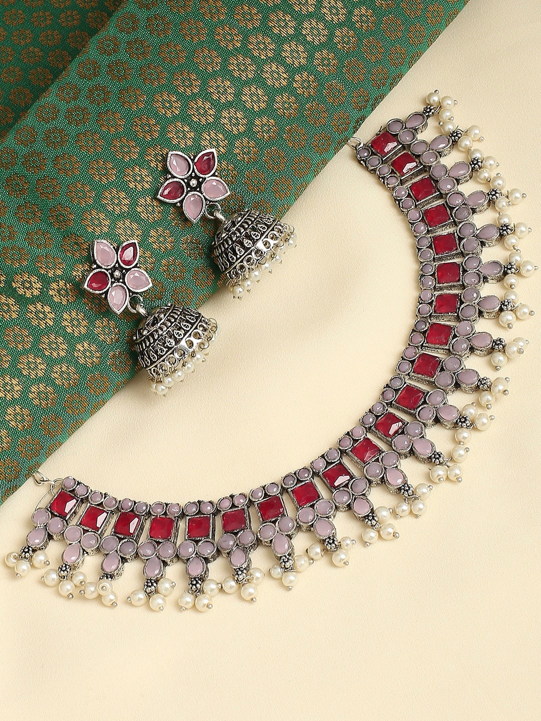 

OOMPH Women Silver-Plated Oxidized Red Stone-Studded & Beaded Jewellery Set