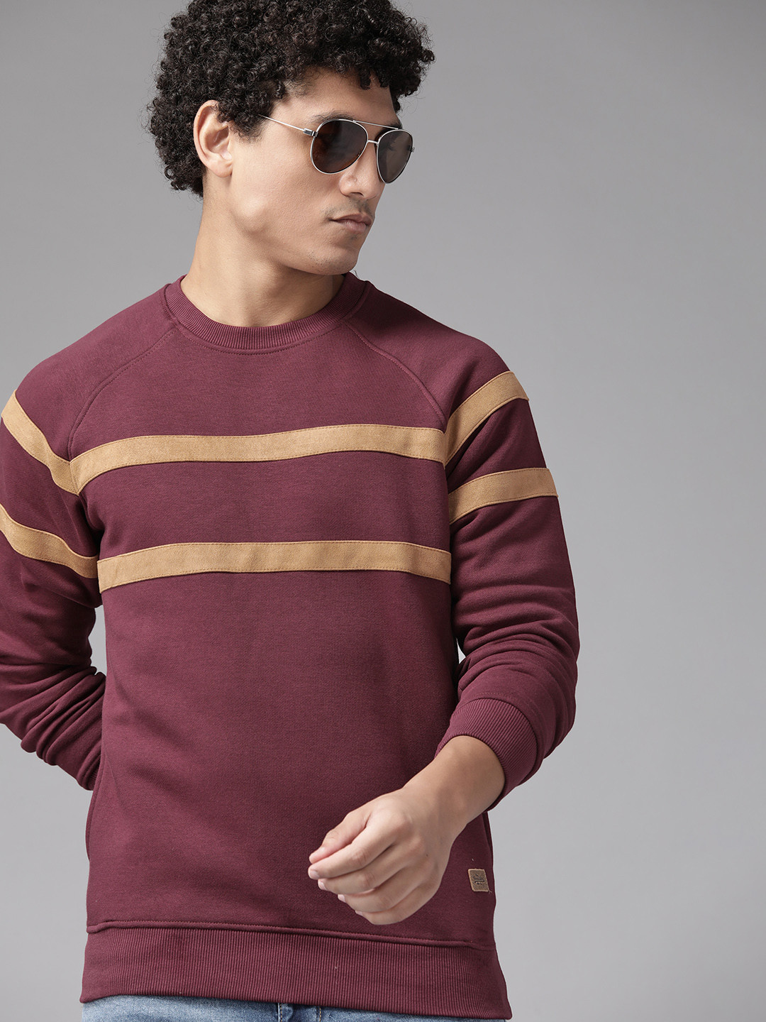 

Roadster Men Maroon & Beige Striped Sweatshirt
