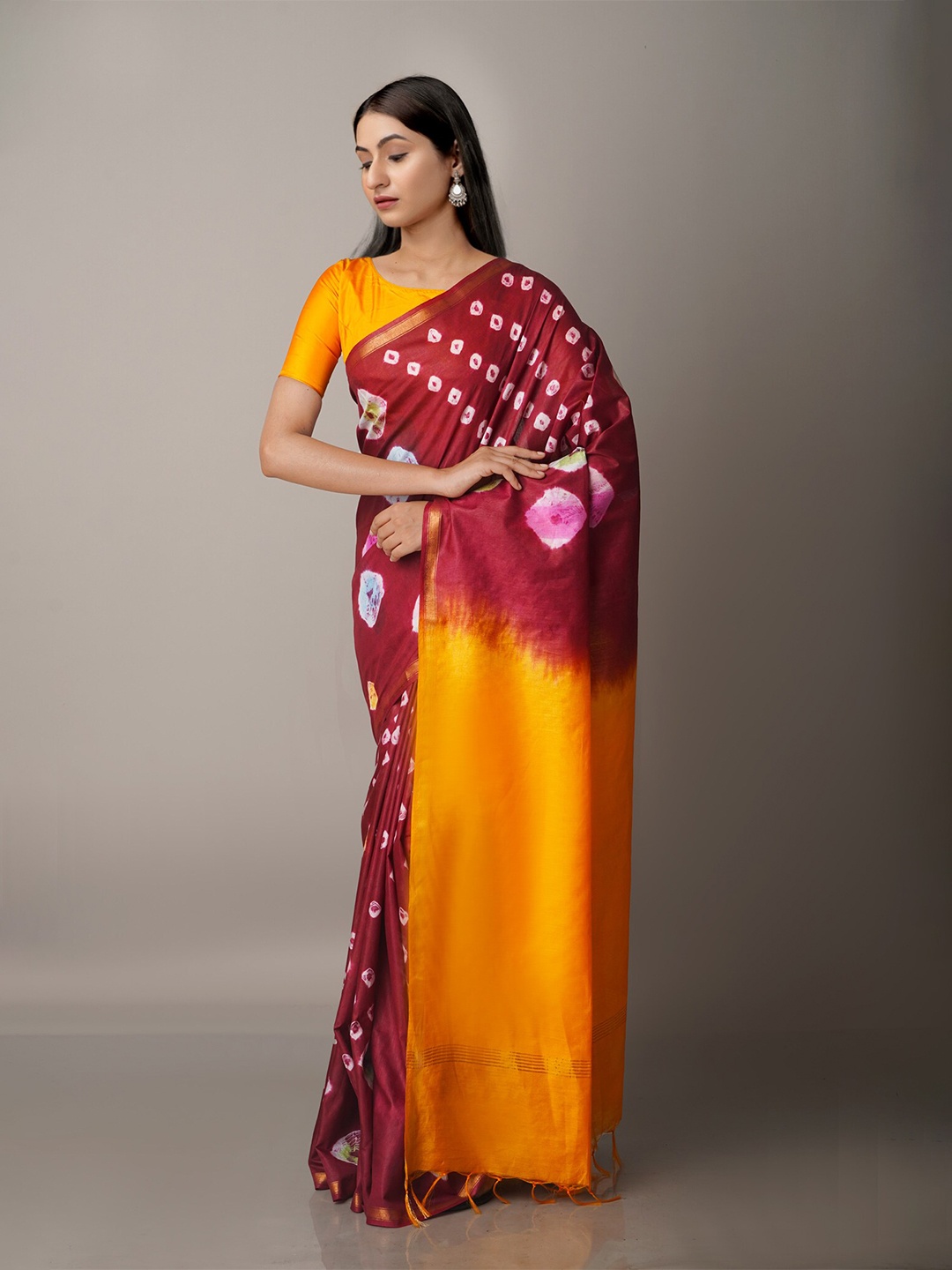 

Unnati Silks Maroon & Yellow Bandhani Zari Silk Cotton Chanderi Saree