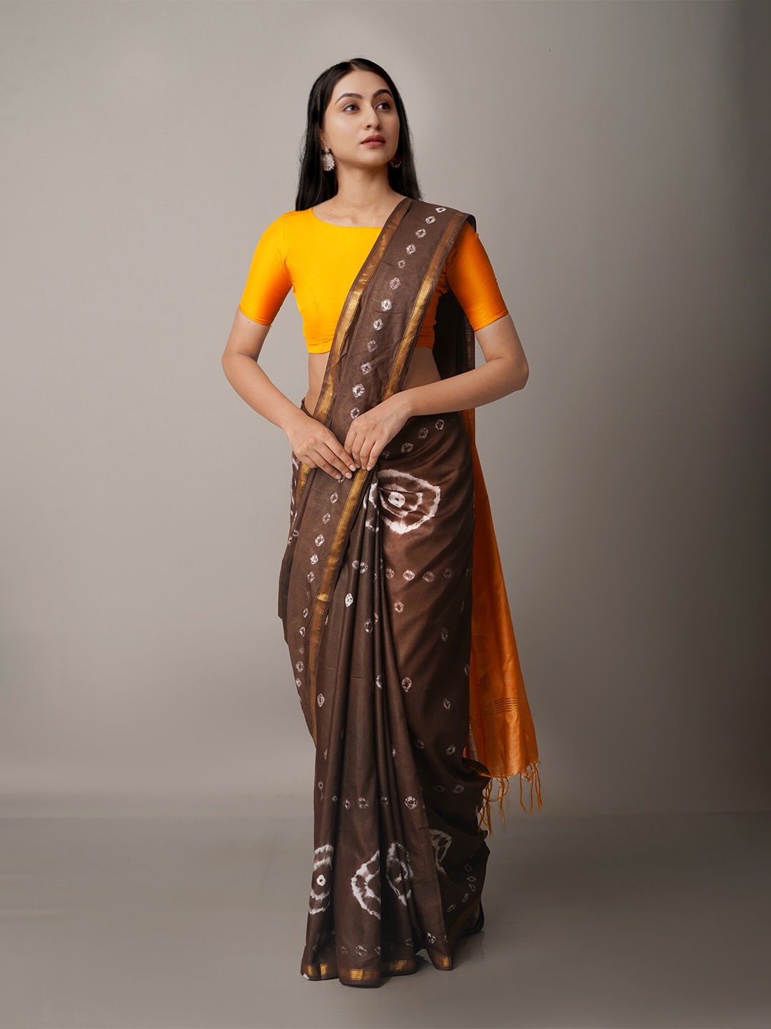 

Unnati Silks Brown & Orange Batik Zari Silk Cotton Chanderi Saree