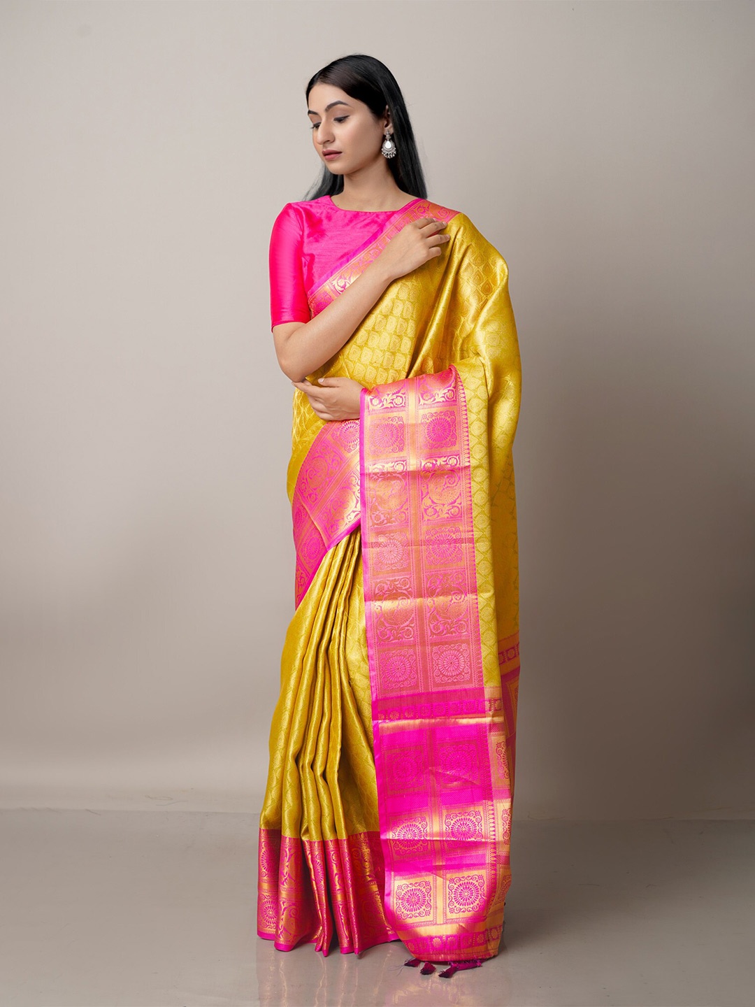 

Unnati Silks Yellow & Pink Woven Design Zari Silk Blend Banarasi Saree
