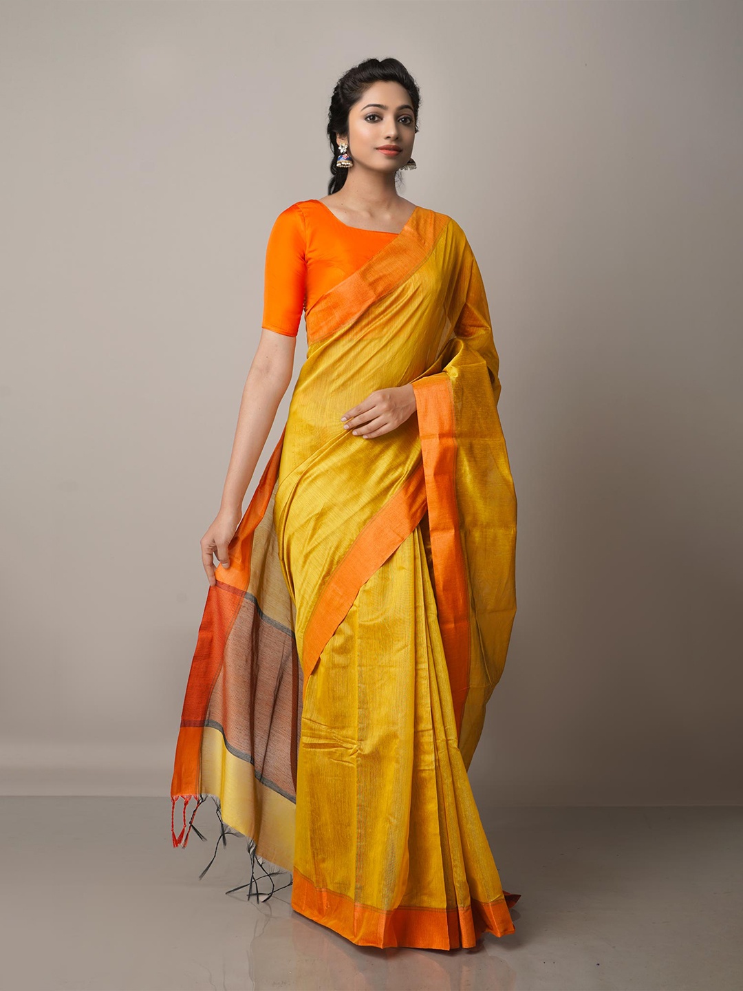 

Unnati Silks Brown & Yellow Silk Cotton Chanderi Saree