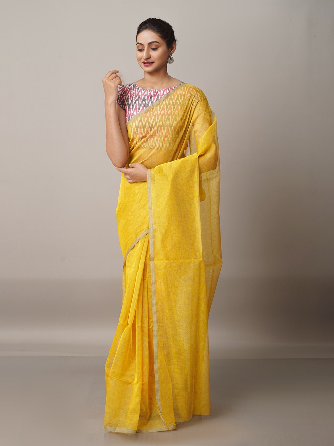 

Unnati Silks Yellow Woven Design Zari Net Banarasi Saree